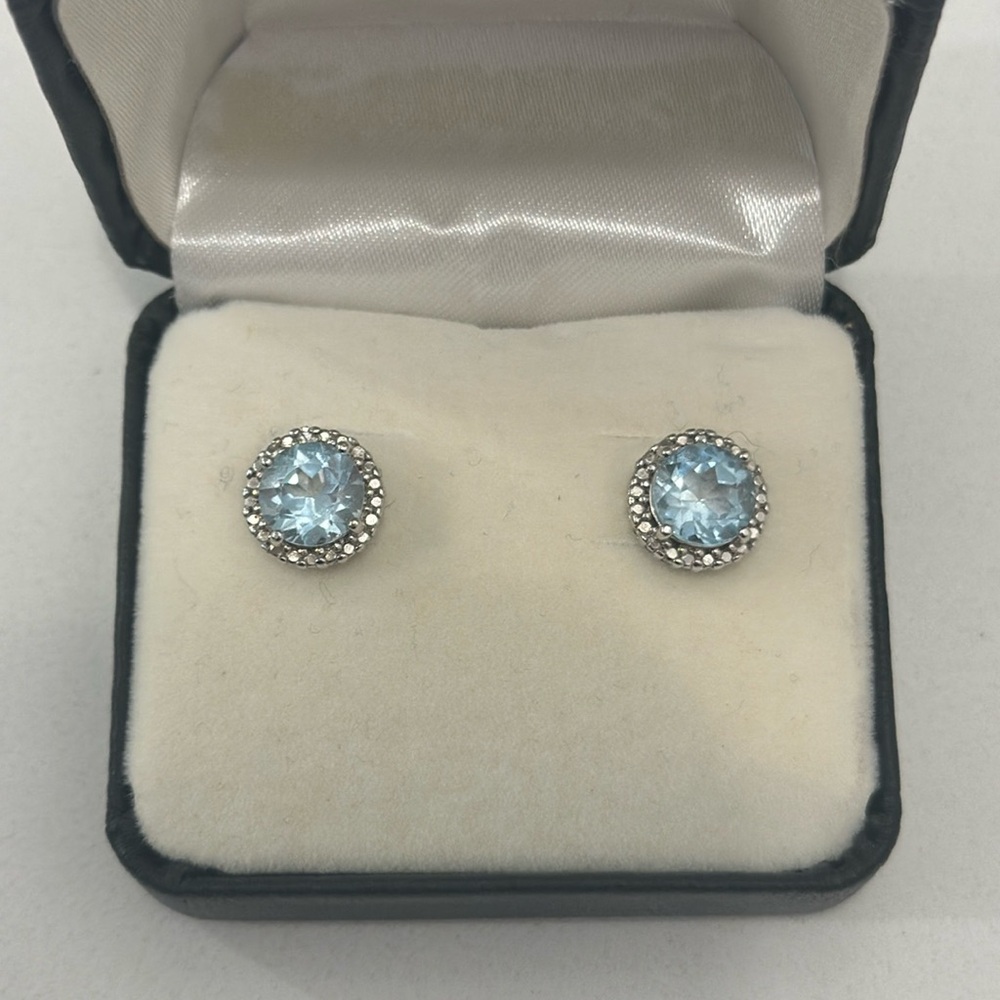 Aquamarine studs with pave halo